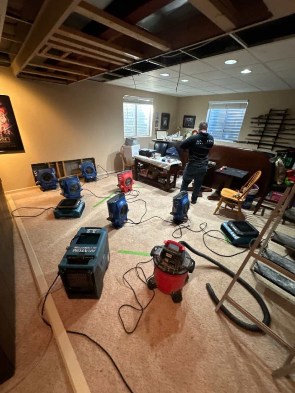 Water damage restoration in progress with drying equipment