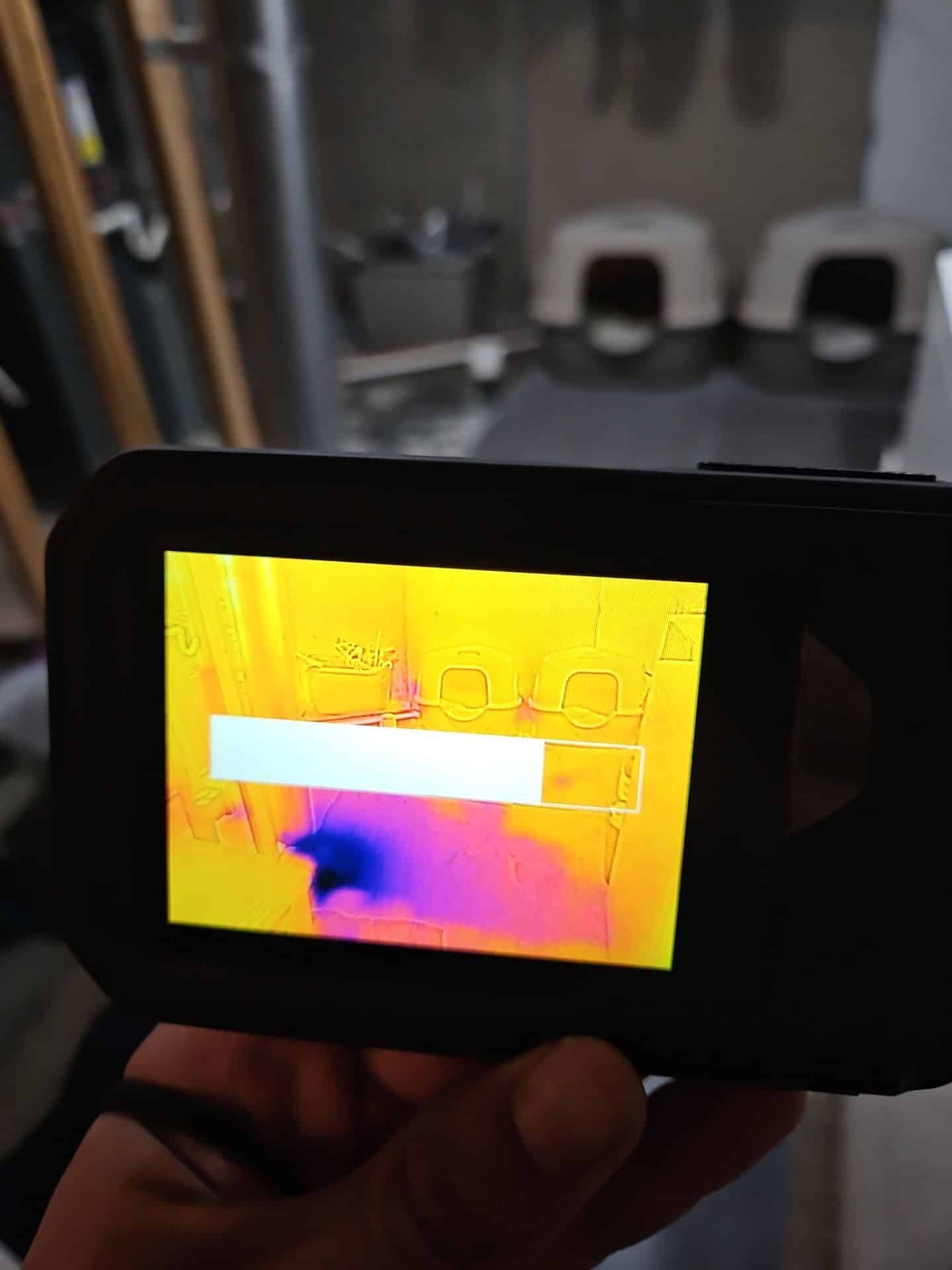 Thermal camera showing moisture on a wall