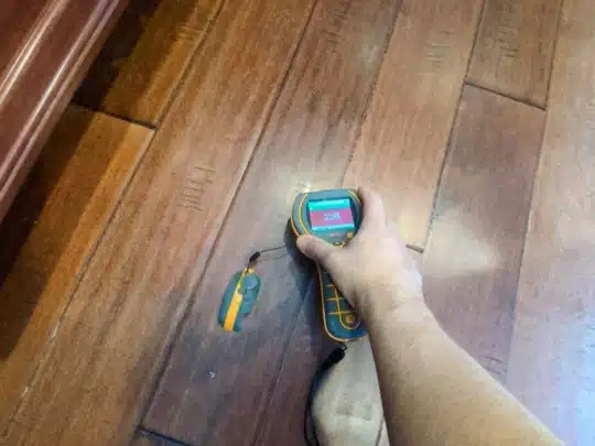 High Moisture Reading Detected Under Hardwood Flooring – Potential Hidden Water Damage