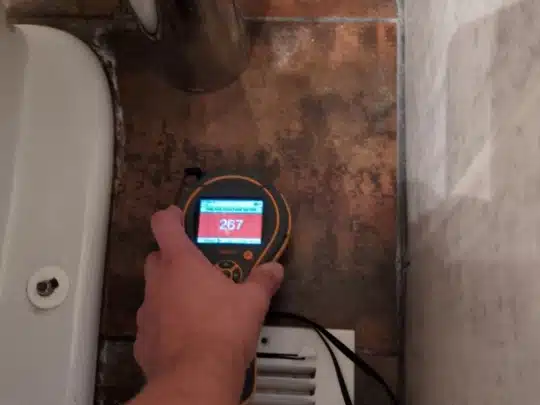 Moisture Detection Near Toilet – Elevated Readings Indicate Potential Leak