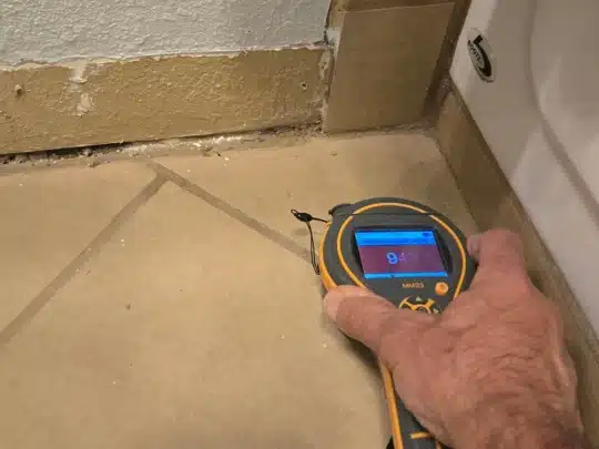 Moisture Detection in Tile Flooring Near Water-Damaged Wall