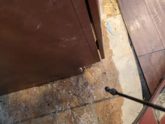 Water Intrusion Detected Beneath Cabinet and Flooring – Signs of Subfloor Damage