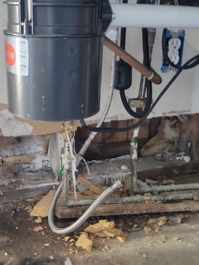 Water-damaged area under sink
