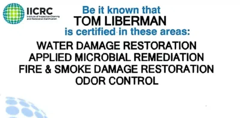 A certification card issued by the IICRC showing that a technician is certified in water damage restoration, microbial remediation, fire and smoke damage restoration, and odor control. The card includes a register number and expiration date.