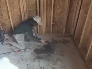 Cleaning soot and fire residue from floor after damage