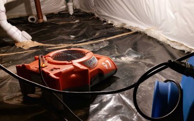 Air mover and drying equipment placed in a sealed crawl space.